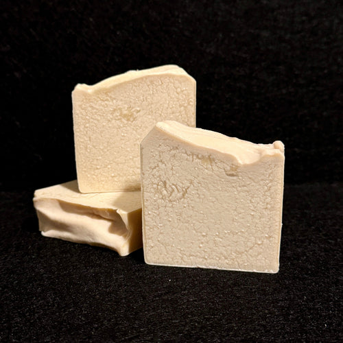 3 white bars of soap with a crackled appearance